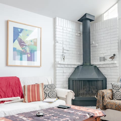 Light up the huge wood-burning stove in winter