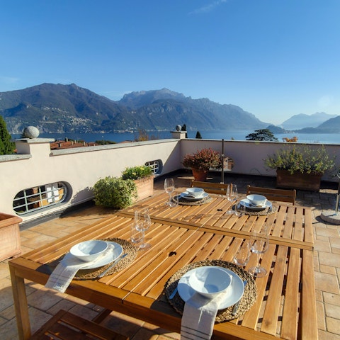 Admire views of Lake Como while dining alfresco