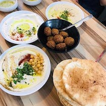 Eat authentic hummus at Abu Hassan