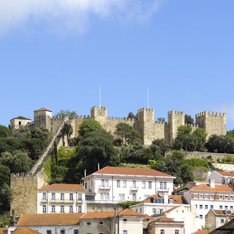 Admire the amazing view of the São Jorge Castle