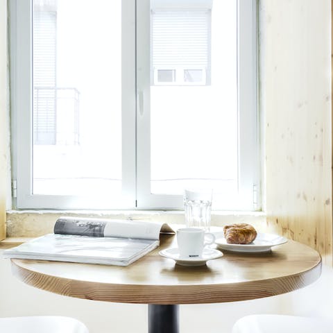 Enjoy fresh coffee and pastries in the sunny breakfast spot