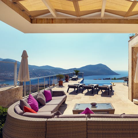 Gather on the corner sofa for after-dinner drinks as you enjoy the view of Kalamar Bay