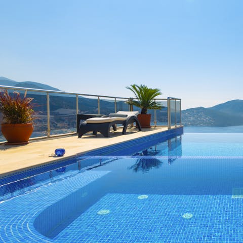 Pour yourself a glass of wine and sit back in the Jacuzzi to relax