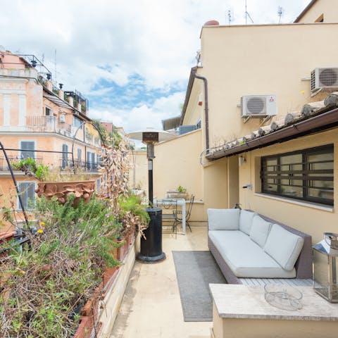A balcony lined with flowers