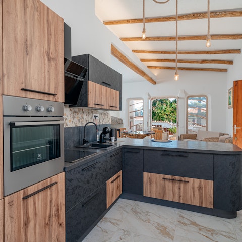 Cook in the modern kitchen and dine outside on the veranda