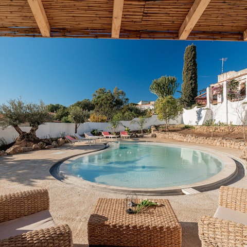 Soak up the sun beside the private pool