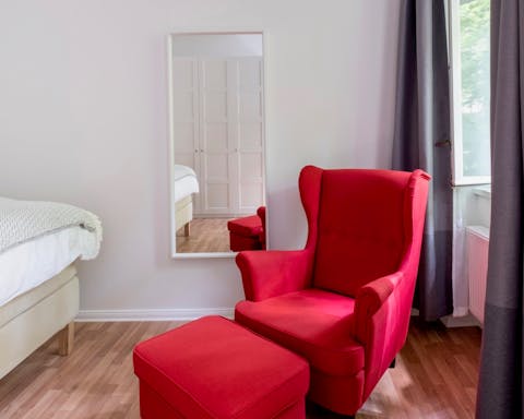 The scarlet red armchair 