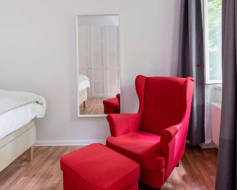 The scarlet red armchair