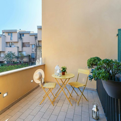 Sip an Aperol spritz on the balcony before heading out to dinner