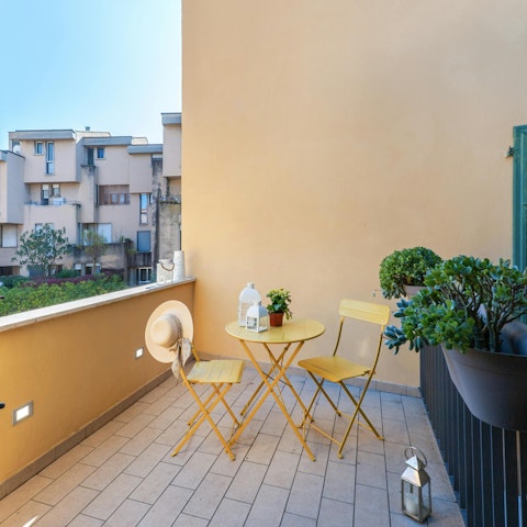 Sip an Aperol spritz on the balcony before heading out to dinner