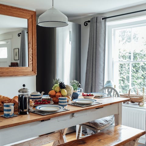 Enjoy a meal at the kitchen's rustic dining table