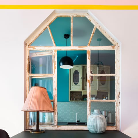 The vintage-style window to the kitchen