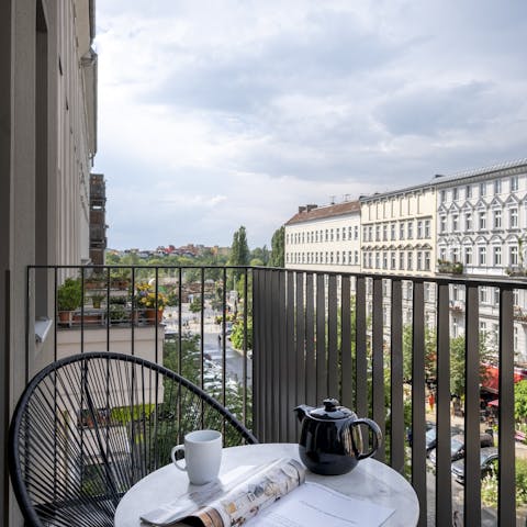 The sunny balcony overlooking the street