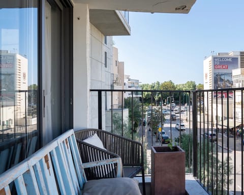 A balcony with street views