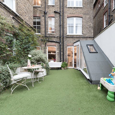 Enjoy your morning coffee in the sleek garden area