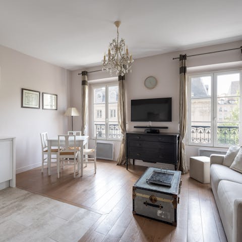 Enjoy a light-filled living room courtesy of traditional French windows