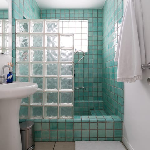 Teal tiles for a tranquil shower
