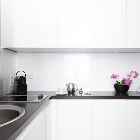 Fire up the coffee pod machine in the sleek and modern kitchen