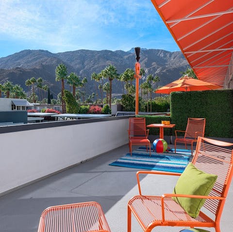 Sunbathe on your private balcony with views of the San Jacinto Mountains