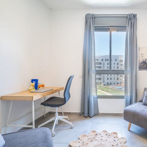 Catch up on important work at the dedicated desk space