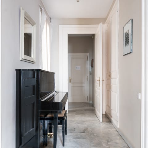 Try your hand at the upright piano in the musician's corner