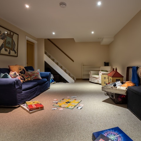 Cosy up for movie nights in the games den room