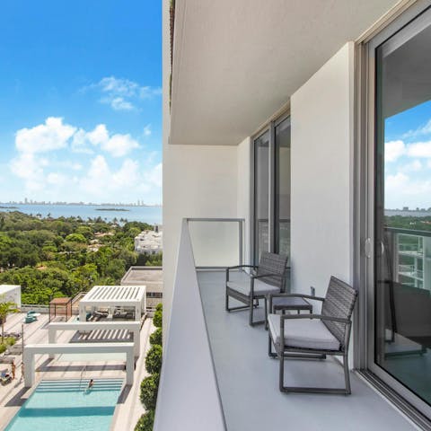 Admire bay views from the private balcony