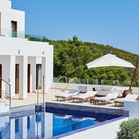 Spend all day sprawled out by the private pool