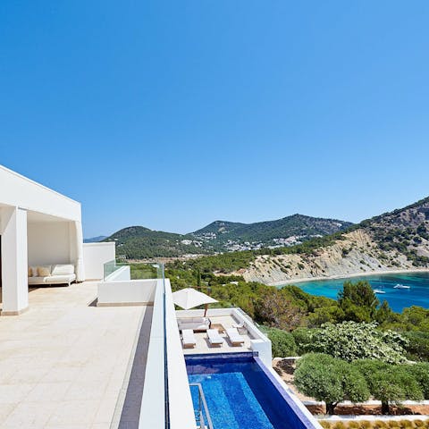 Gaze out over the cove of Sol den Serra from the upstairs terrace
