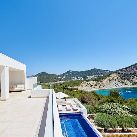 Gaze out over the cove of Sol den Serra from the upstairs terrace