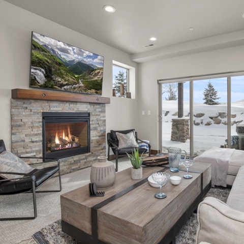 Gather in the living room for drinks and games by the fire