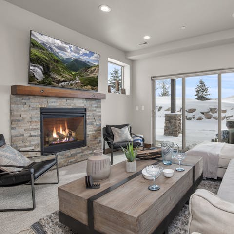 Gather in the living room for drinks and games by the fire