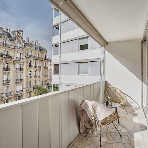 Step onto the balcony with a morning cup of coffee