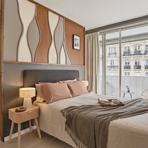 Snuggle up in bed after a busy day in Paris