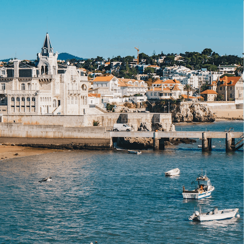 Hotfoot it down to Praia da Ribeira de Cascais, fifteen minutes from your building