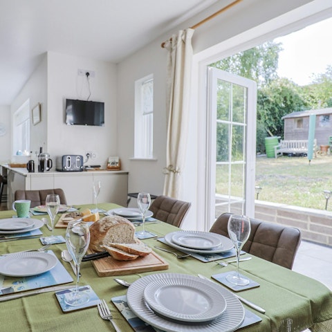 Enjoy meals with doors opening straight to the garden