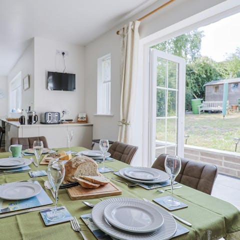 Enjoy meals with doors opening straight to the garden