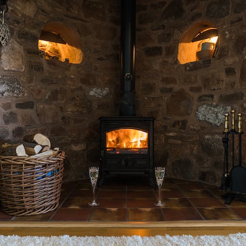 Cosy up by the wood-burning stove
