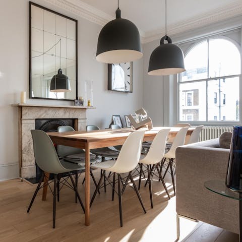 Sit down to an elegant meal at the long dining table