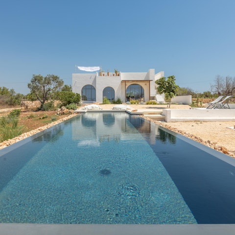 Relax by the private pool in the Italian sun