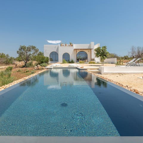 Relax by the private pool in the Italian sun