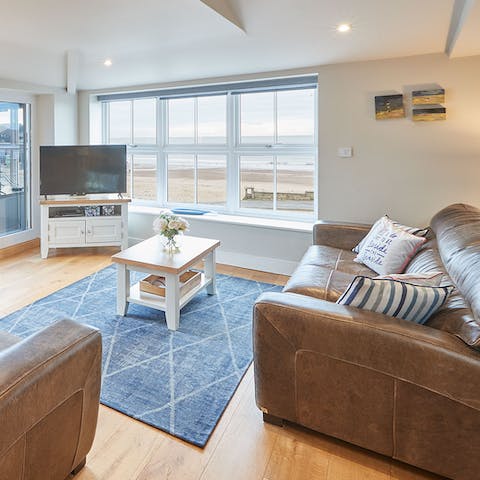 Curl up with a cuppa and watch the ever-changing tides through your window
