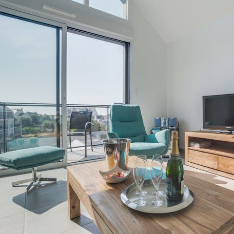 Slide open the French doors to let the sea breeze in