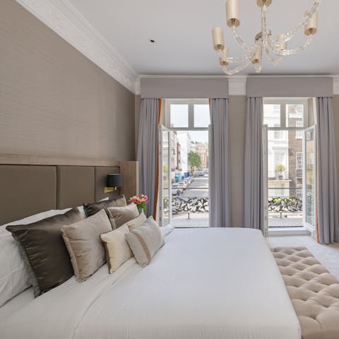 Watch Mayfair's bustle from the bedroom balcony