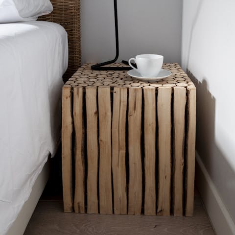 The wooden block beside table