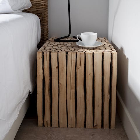 The wooden block beside table