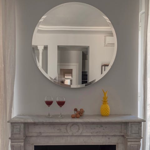 The fireplace mirror
