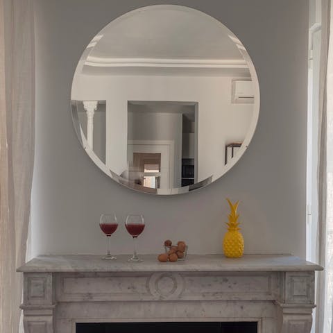 The fireplace mirror