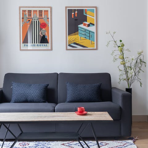 Sprawl out on the cosy sofa after a busy day roaming around France's capital