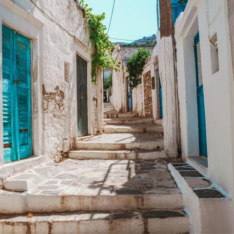 Drive seven-minutes into Naxos Town and walk the cobbled streets